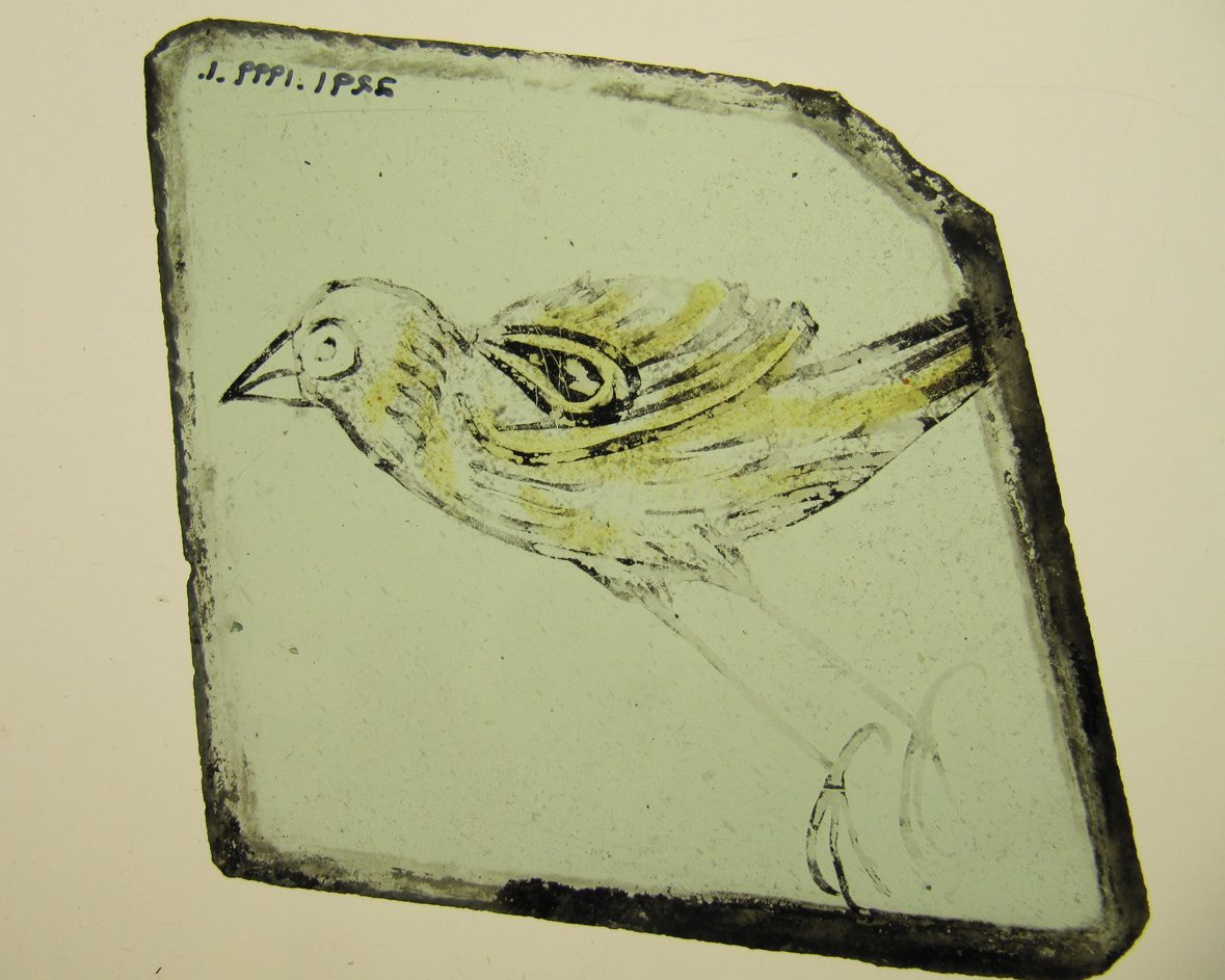 Glass pane decorated with a bird